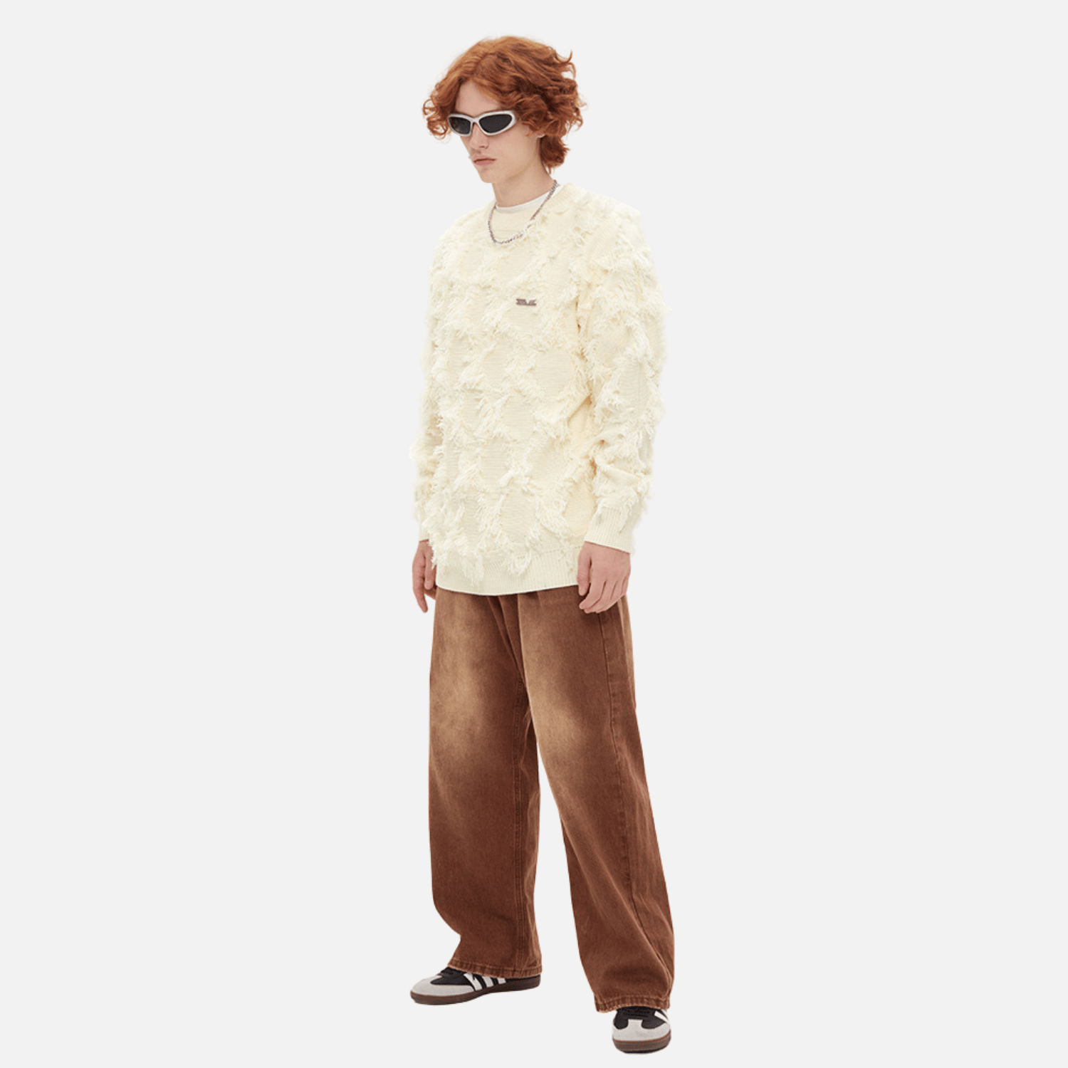 Stilvoller Strickpullover mit Quaste