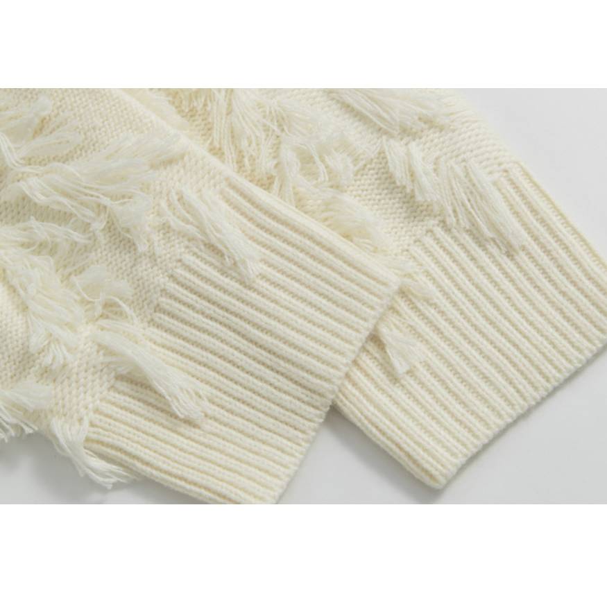 Stilvoller Strickpullover mit Quaste