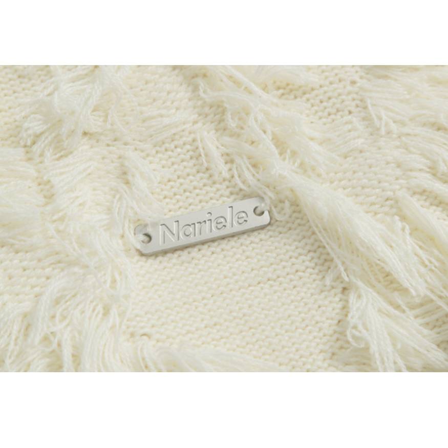 Stilvoller Strickpullover mit Quaste