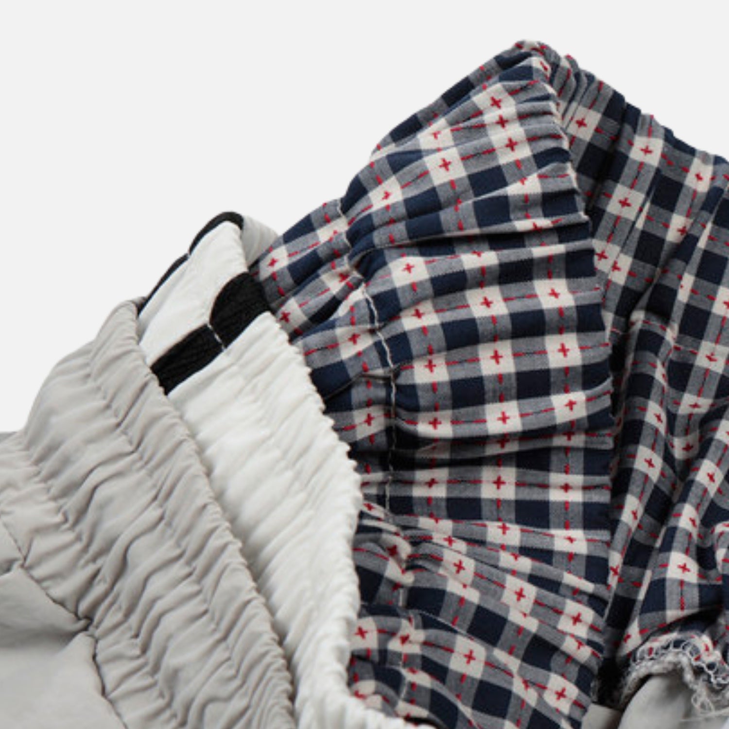 Pantalones de doble cintura con efecto de doble capa