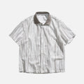 Camicia a maniche corte con taglio e blocchi di colore