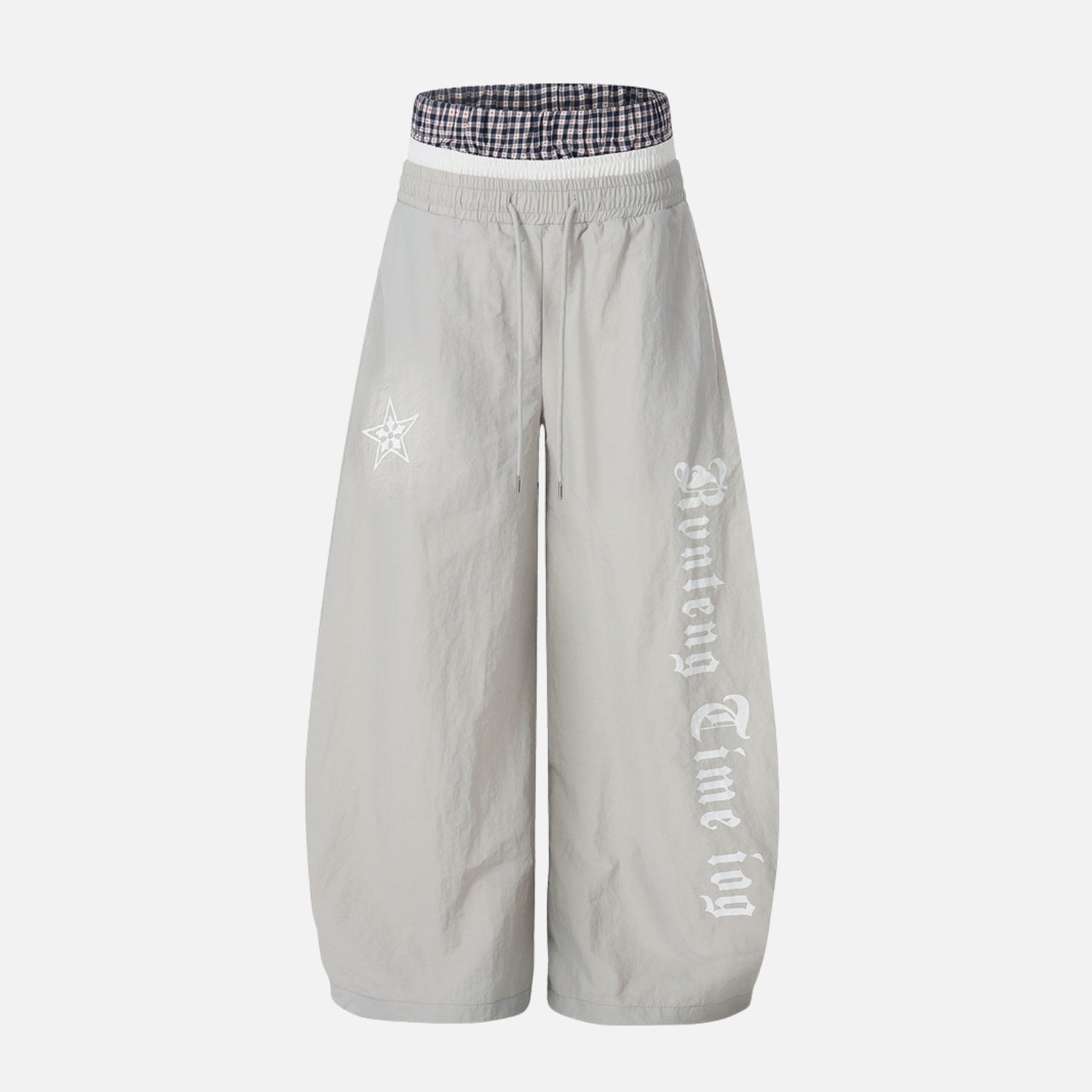 Pantalones de doble cintura con efecto de doble capa