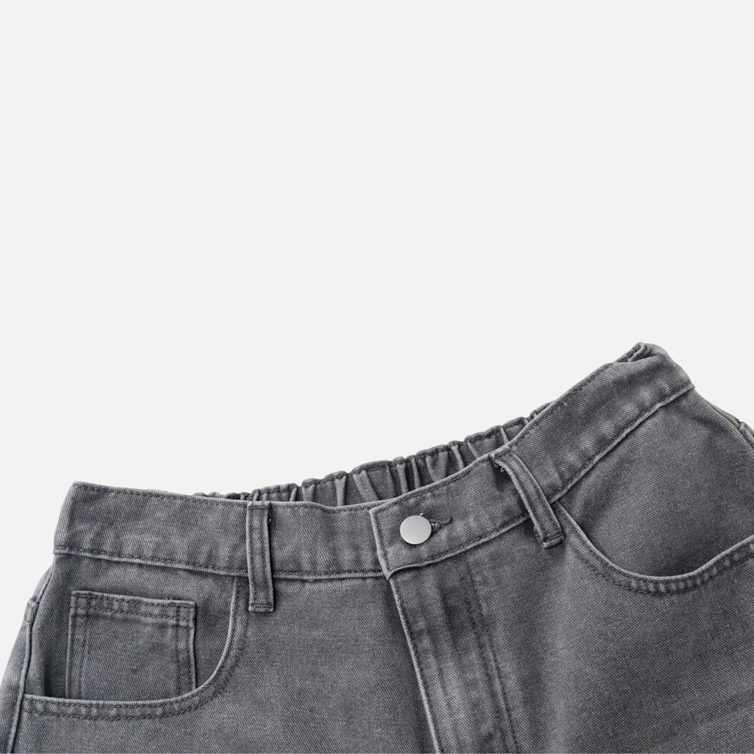 Shorts de mezclilla lavada y desgarrados
