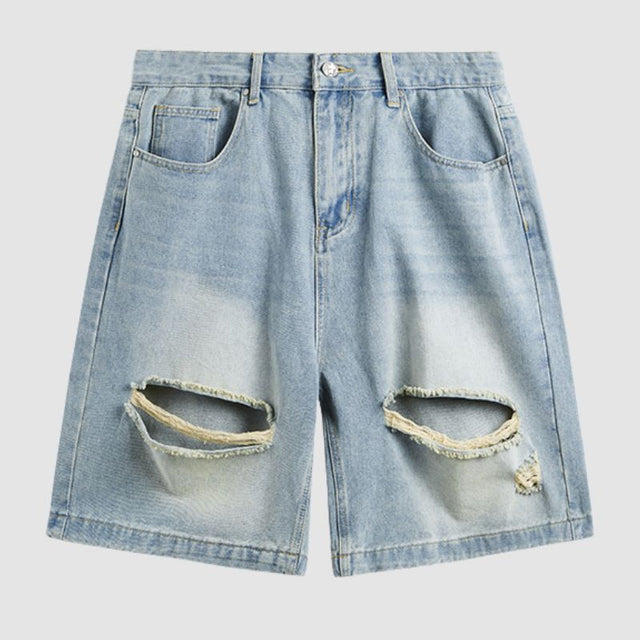 Pantalones cortos de mezclilla rasgados y rayados