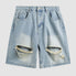Pantalones cortos de mezclilla rasgados y rayados