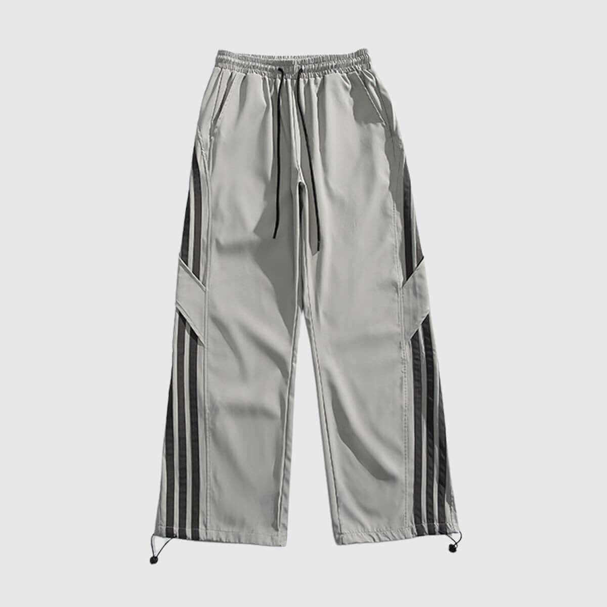 Side stripe sweatpants in light grey with bold black stripes, adjustable waistband, ideal for casual wear.