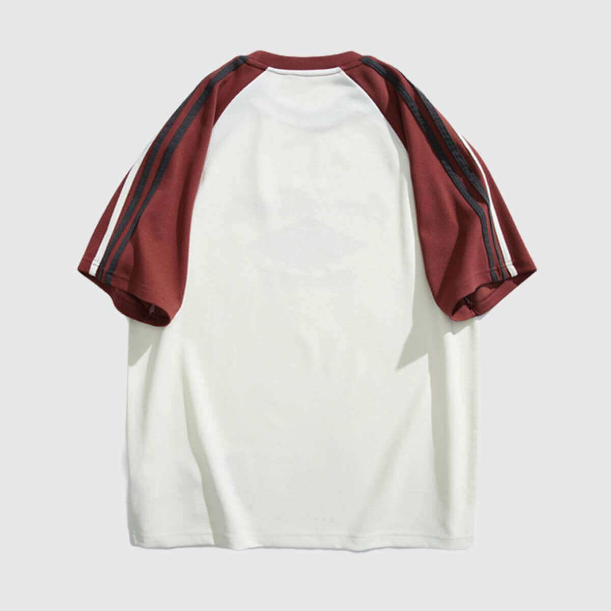 Vintage graphic raglan shirt showcasing bold color sleeves and casual fit, perfect for unisex daily wear.