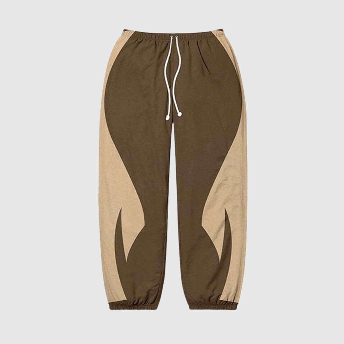Trendy Y2K colorblock jogger pants in brown and beige with elastic waistband and adjustable drawstring.