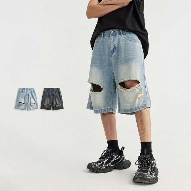 Pantalones cortos de mezclilla rasgados y rayados