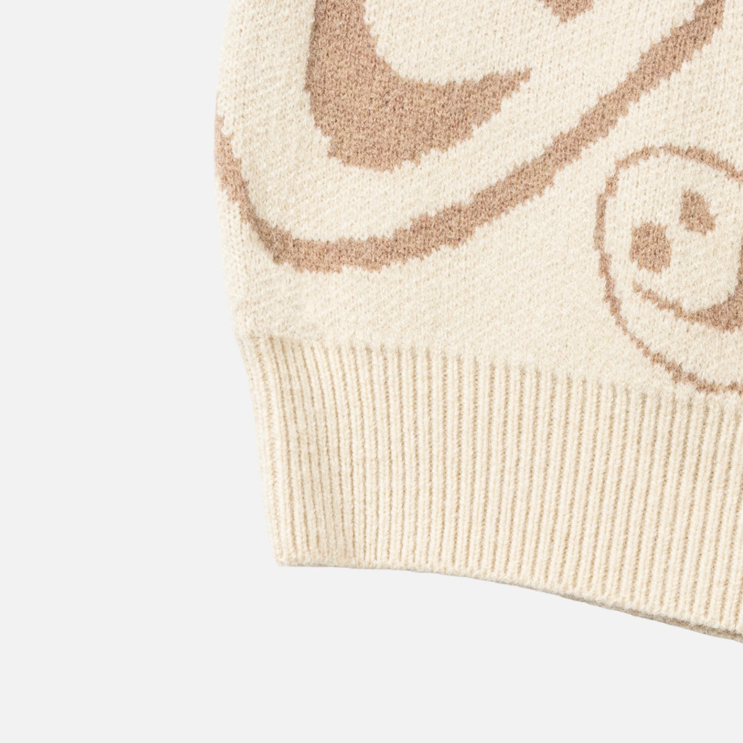 Suéter jacquard con caritas sonrientes por toda la prenda