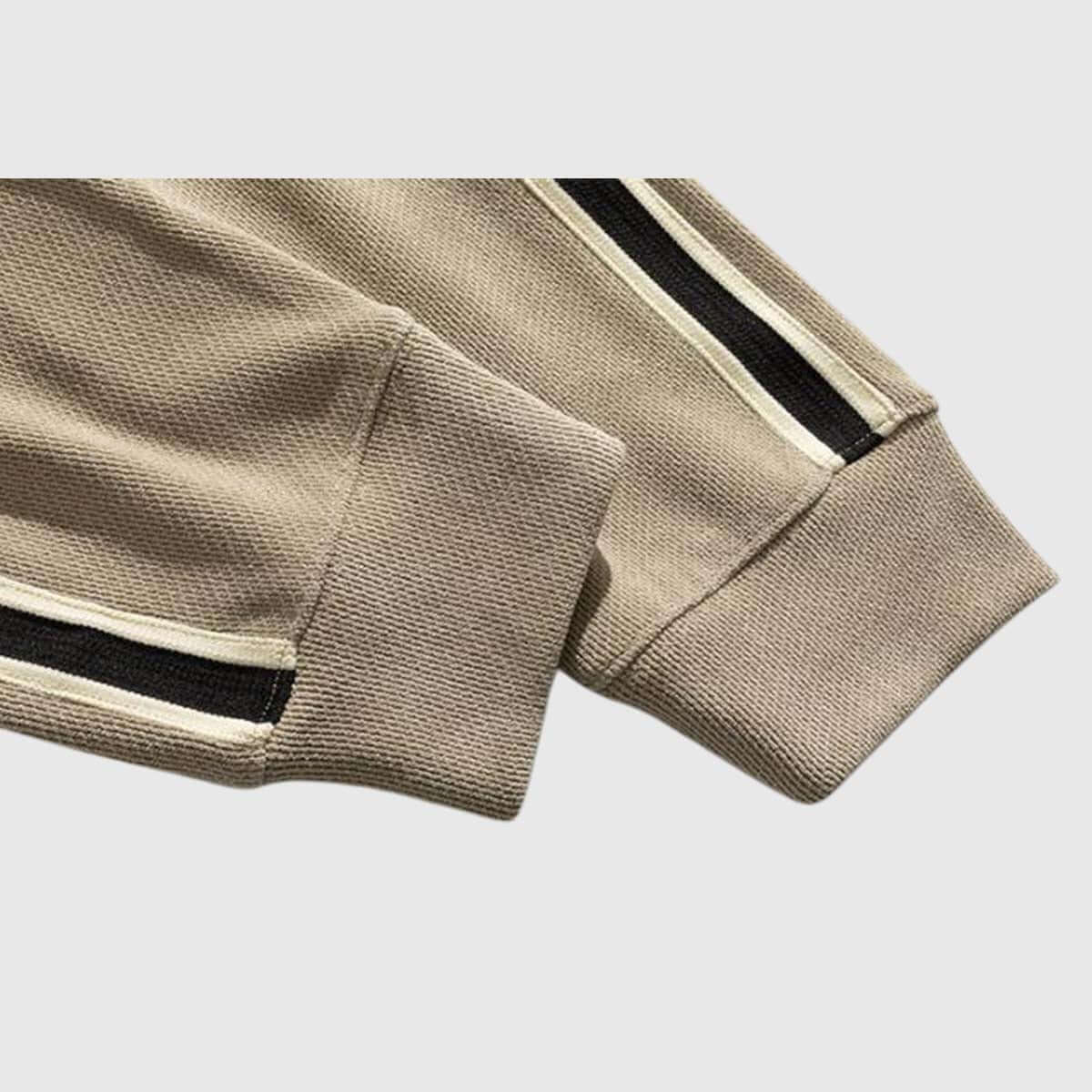 Jersey de media cremallera con mangas a rayas
