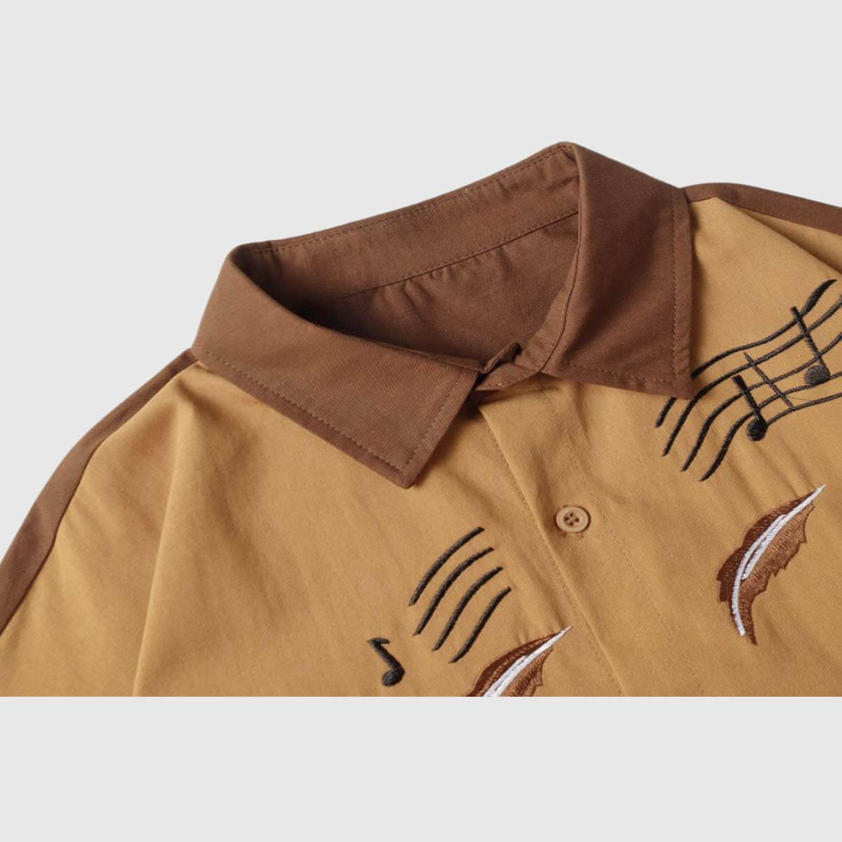 Detail view -1 of the brown unisex embroidered cat short sleeve shirt in brown