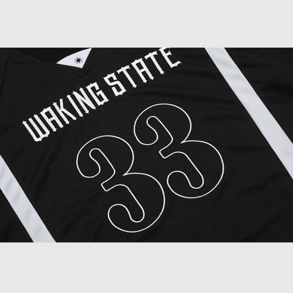 Detail view -2  of the unisex's number V-neck jersey in black