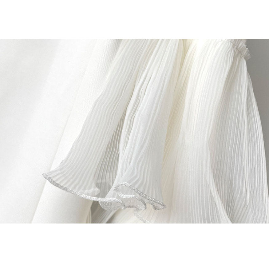 Elegante blazer de malla con volantes de decoración