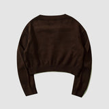 Kurzer Pullover mit Neckholder-Stickerei und Quaste