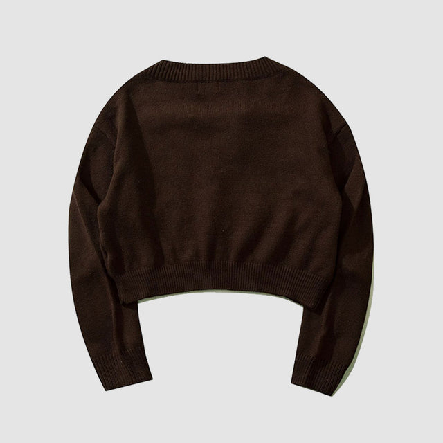 Kurzer Pullover mit Neckholder-Stickerei und Quaste
