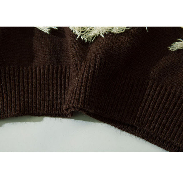 Kurzer Pullover mit Neckholder-Stickerei und Quaste