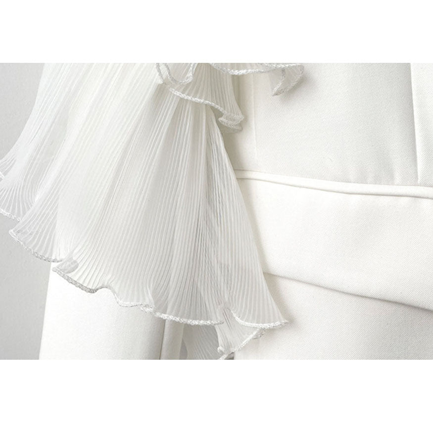 Elegante blazer de malla con volantes de decoración