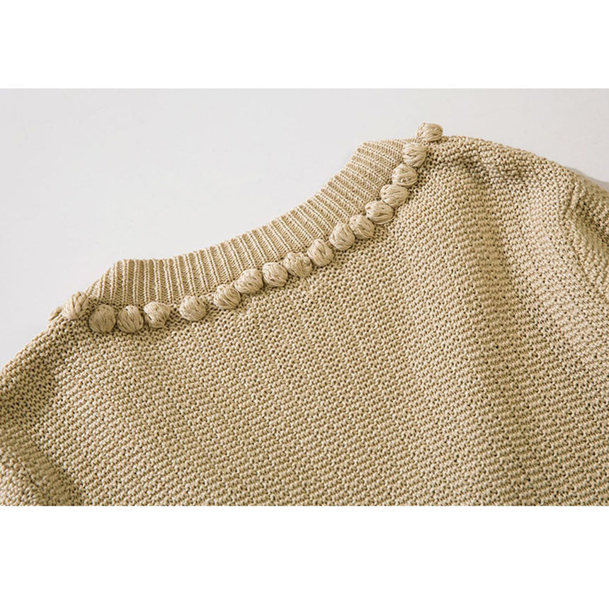 Kurzer Cardigan mit Knopfdekor und Pom-Pom