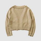 Kurzer Cardigan mit Knopfdekor und Pom-Pom