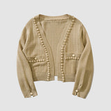 Kurzer Cardigan mit Knopfdekor und Pom-Pom