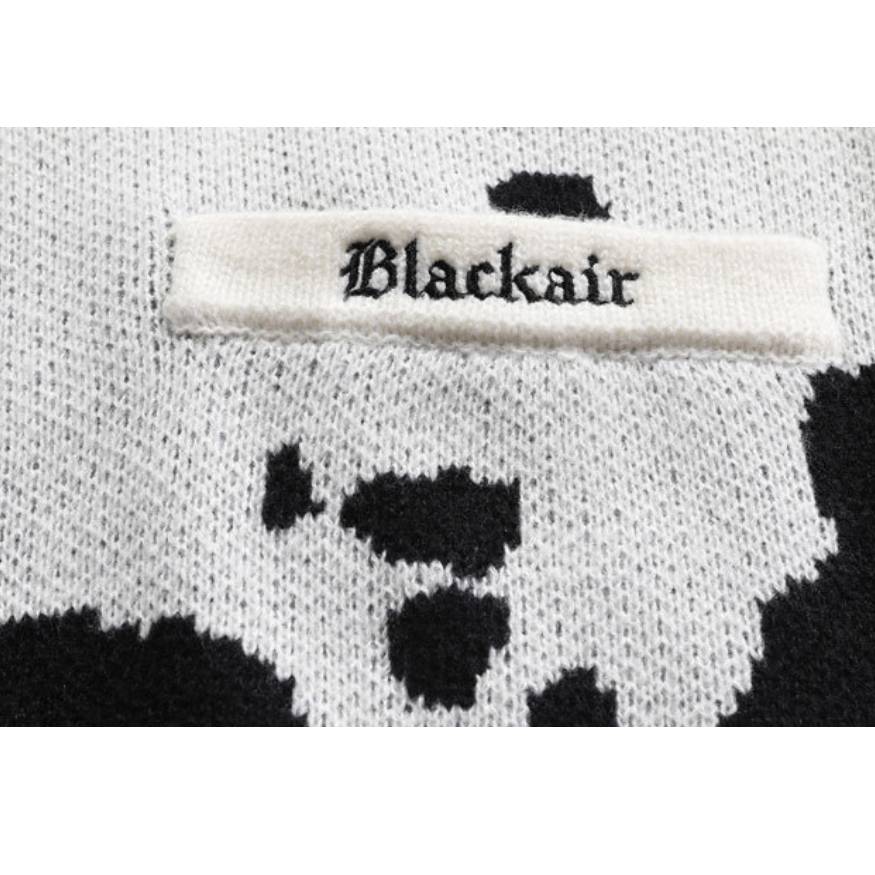 Suéter tipo cárdigan con estampado de vaca