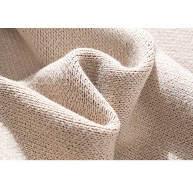Pullover mit Herzmuster und Fadennähten