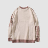 Pullover mit Herzmuster und Fadennähten