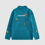Bestickter Bärenpullover