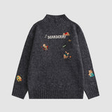 Bestickter Bärenpullover