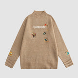 Bestickter Bärenpullover